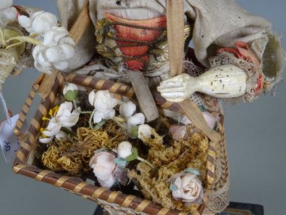 null Antique wind-up automaton "La marchande de fleurs", German bisque head doll...