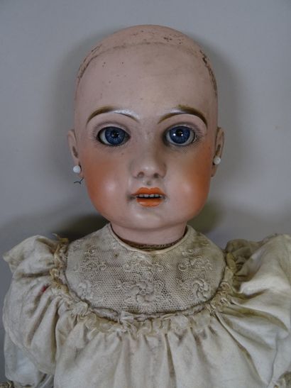 null Jumeau type head doll, size 11, bisque head, blue glass eyes, open mouth, articulated...