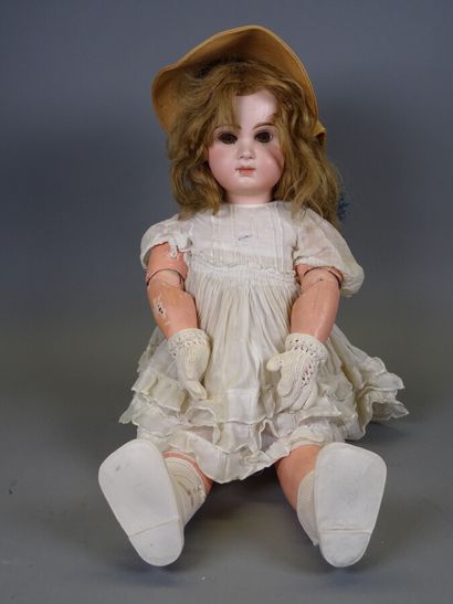 French doll with bisque head marked Tête...