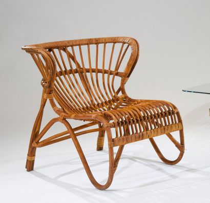 null Viggo BOESEN (1907-1985)

Chauffeuse modèle "Fox lounge chair" en rotin tressé

Modèle...