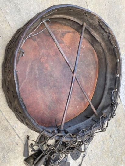 null Nepalese shamanic drum in leather, wood, brass and metal

Nepal 19th century

Diameter...