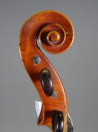 null Anonymous violin made in Mirecourt around 1900. Two pieces back 360 mm

With...