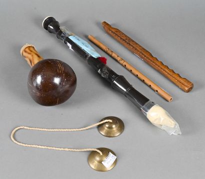null Lot including: a Yugoslavian carved walnut six-hole flute, a pair of Tibetan...