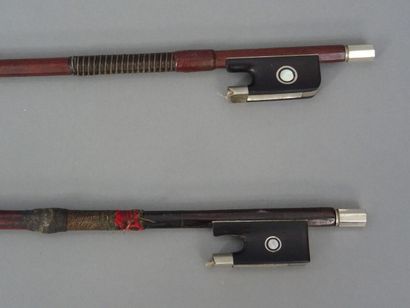 null Set of two violin bows :

- one signed Pikadoulak in bee wood mounted nickel...