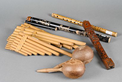 null Lot including: Three South American bamboo pan flutes, two Cuba maracas, two...