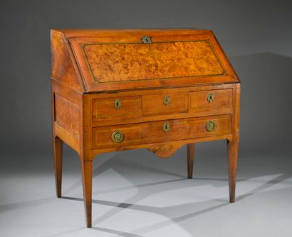 null Sloping desk, the flap inlaid with burr walnut in polychrome nets. It opens...