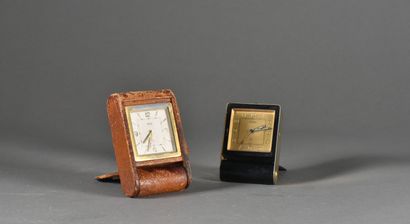 null JAEGER LECOULTRE

Two travel alarm clocks, one in leather, the other in gilt...