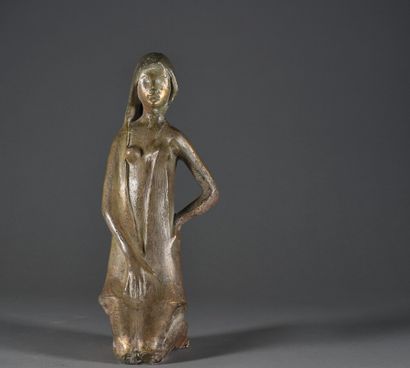 null Kneeling woman

Terracotta with a patina in imitation of bronze

Bears a label...