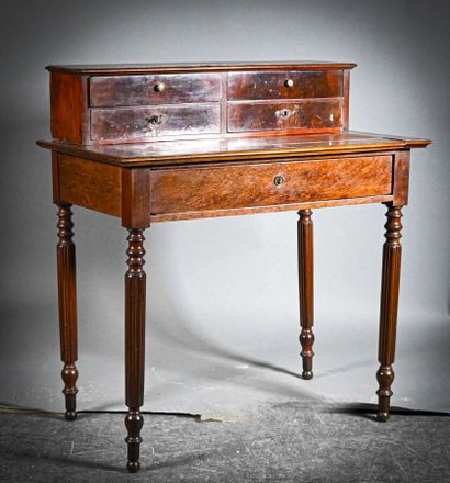 null Mahogany desk with four stepped drawers and a drawer in the belt, red morocco...