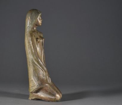 null Kneeling woman

Terracotta with a patina in imitation of bronze

Bears a label...