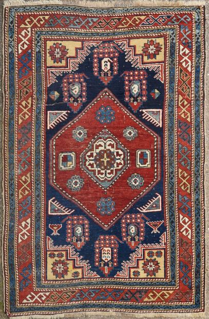 null SHIRVAN HILLA - CAUCASUS

Wool carpet decorated with a central hexagonal medallion...