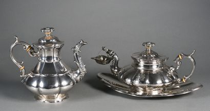 null Set of four silver pieces including a coffee pot, a silver teapot with large...