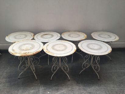 null Suite of seven round iron garden tables, the top in pierced sheet metal and...