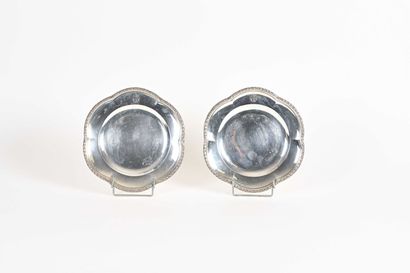 null Pair of round poly-lobed silver plates, laurel mouldings with a lion holding...