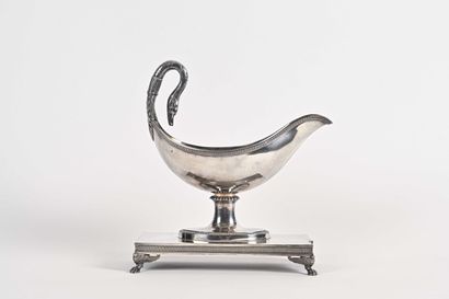 null A very important plain silver swan-neck gravy boat on a pedestal; rectangular...