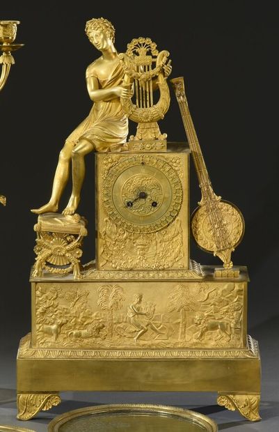 null Important ormolu clock with Orpheus playing the lyre, a stringed instrument...