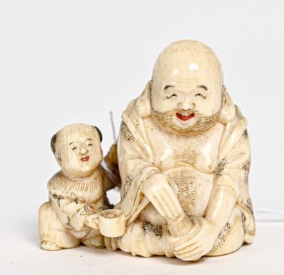 null ** JAPON - Période MEIJI (1868-1912) 

Netsuke en ivoire, hotei et enfant assis,...