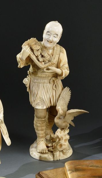 null JAPAN - MEIJI period (1868-1912) 

Large carved walrus ivory okimono, with a...