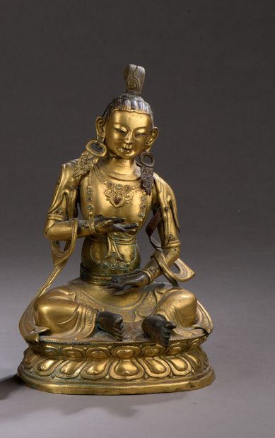 null Divinité bouddhique

Fonte de bronze doré pour le buste, cuivre repoussé et...