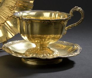 Cup and under cup on pedestal in vermeil...