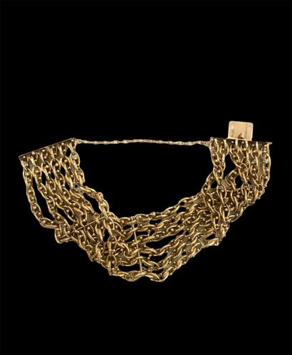 null Bracelet six rangs en or jaune 18K (750 millièmes), les maillons ajourés et...