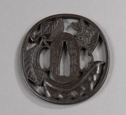 null Iron tsuba maru gata with sukashi decoration of an insect on a branch of beans,...
