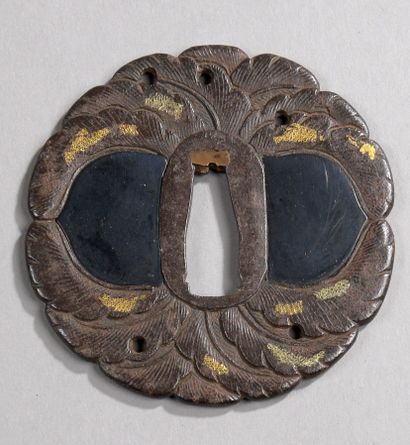 Iron tsuba in the form of several curved...