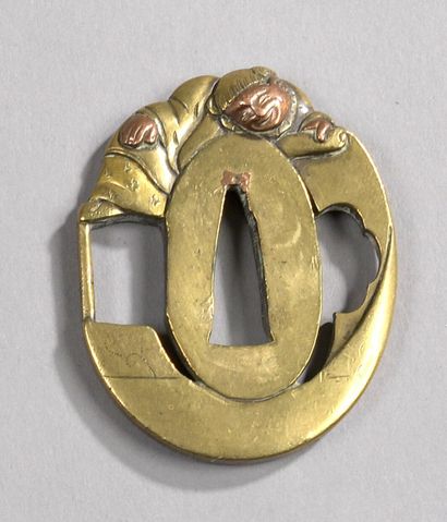 null Tsuba in sentoku showing Kanzan, his face and hands inlaid in copper, opening...