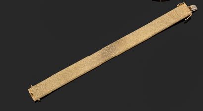 null Bracelet en or jaune 14 K (585 millièmes), mailles articulées à motif de tissage...