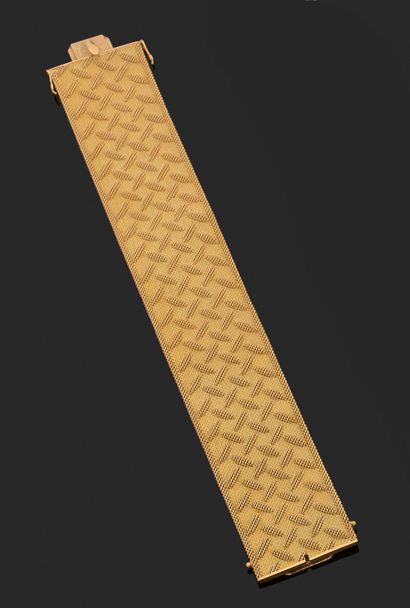 null Bracelet cuff 18 K yellow gold (750 thousandths) with flexible mesh forming...