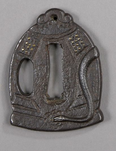 Iron tsuba in the shape of a bell surrounded...