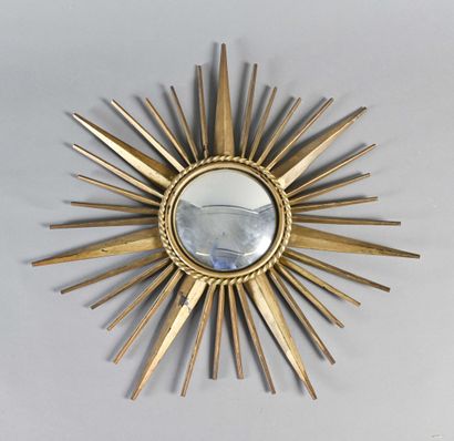 null Ironwork Chaty

Rare sun mirror.

Convex glass set in a twisted frame surrounded...