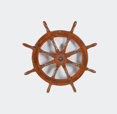 null Barre à roue en bois laqué rouge à huit poignées 

Diamètre 66 cms