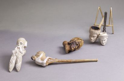null Five clay pipes, the hearths in the shape of heads: a man with a turban of the...