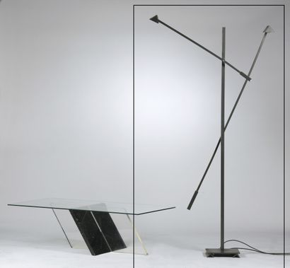 null Work of the 1990's.

Floor lamp, the shaft of square section and supports two...