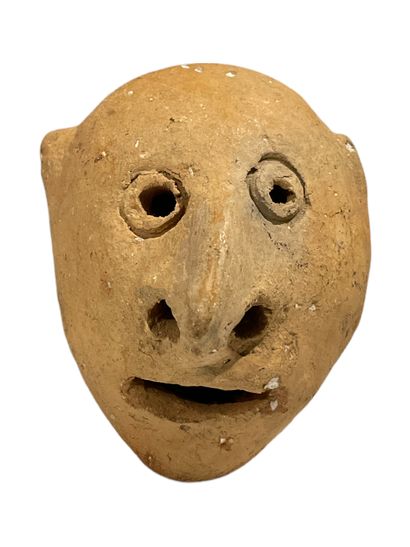 null Head of grotesque in terracotta 


H. 11 cm