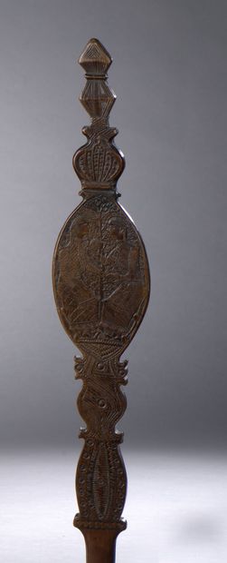 null Quenouille carved with an oblong medallion finely engraved with two women exchanging...