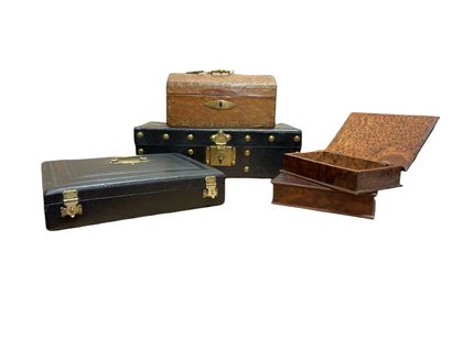 null Five pieces. 


Two black leather boxes, one studded. A curved leather box with...