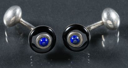null Lot of two pairs of rigid silver cufflinks 925°/°° comprising:

- a pair of...