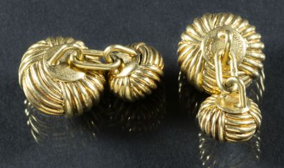 null Paire de boutons de manchette en or jaune 18K (750°/°°) de forme ronde à l'imitation...