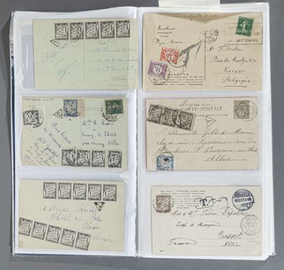 null Ensemble de 75 cartes postales taxées, entre 1900 et 1950. Certaines proviennent...
