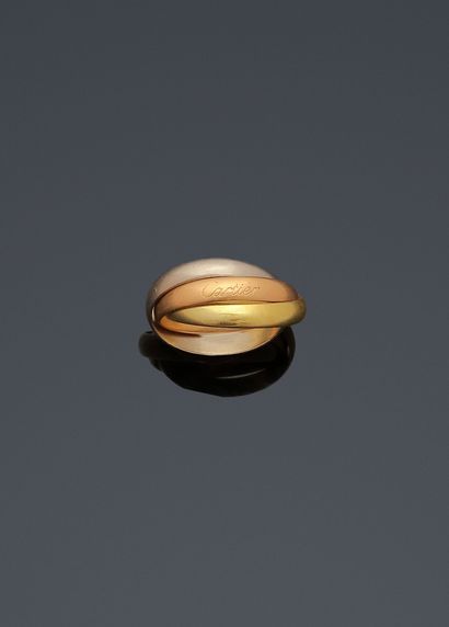 null CARTIER
Collection Trinity
Bague formée de trois anneaux dans les trois tons...