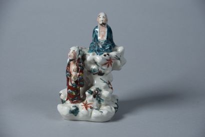 null CHINE - XXe siècle 

Groupe en porcelaine figurant deux chinois sur un rocher

H....