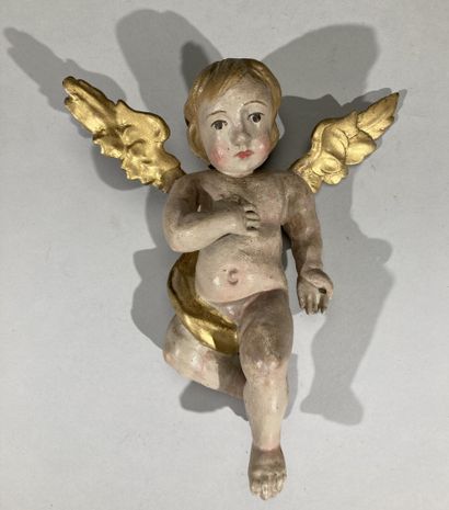 null Angelot en bois sculpté polychrome et doré

XVIIIème siècle

H 27,5 cm BL

Quelques...