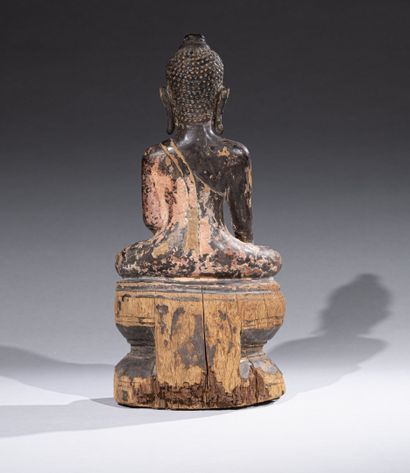 null BURMA, 19th century 

Wooden Buddha seated in padmasana, and taking the earth...