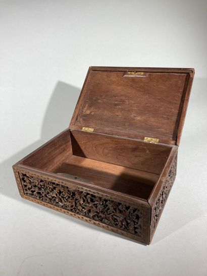null INDOCHINA, 20th century

Rectangular wooden box with carved decoration on the...