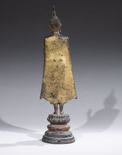 null THAILAND, 19th century

Gold and red lacquered bronze sculpture of Buddha standing...