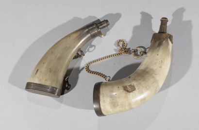 null Two powder flasks

In horn and brass