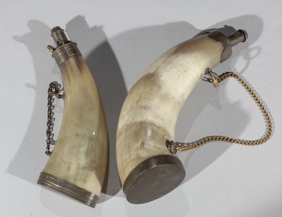 null Two powder flasks

In horn and brass