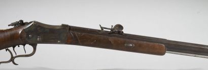 null Rifle of shooting 

Wooden mounting with short barrel, wooden stick in hook...